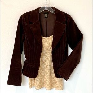 Junior dark brown velvet jacket with soft yellow camisole inside.